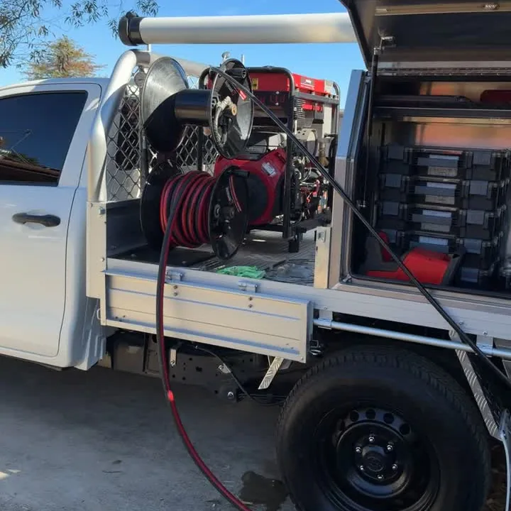 On Call Plumbing ute fitted with drain jetter reels in Canberra
