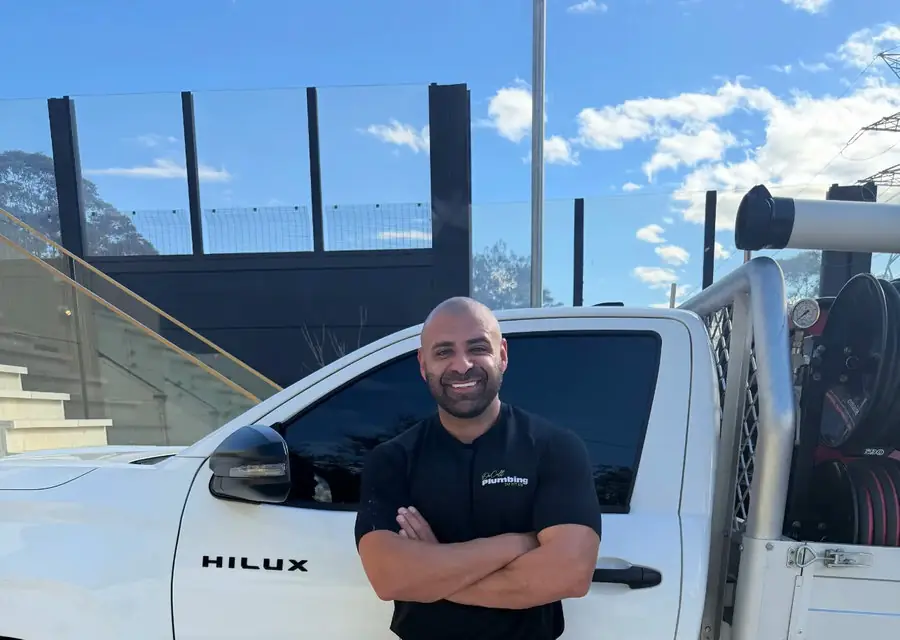 On Call Plumbing owner Sam with the branded Canberra ute